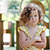 photograph of child, the child is age 4 and standing with her arms crossed